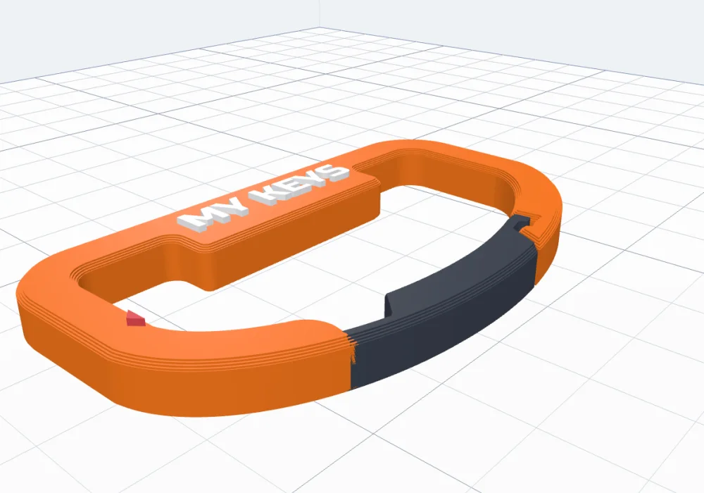The carabiner flat on the bed, ready to print