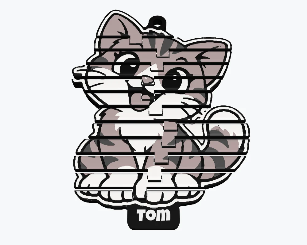 A multi-colour cat sticker keychain named Tom cut into twelve slices joined by hidden pin hinges