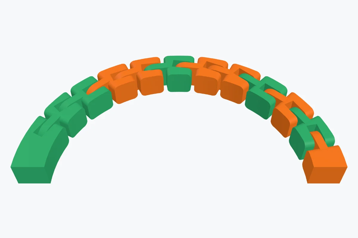 A curved band cut into twelve slices joined by print-in-place pin hinges, every other slice orange