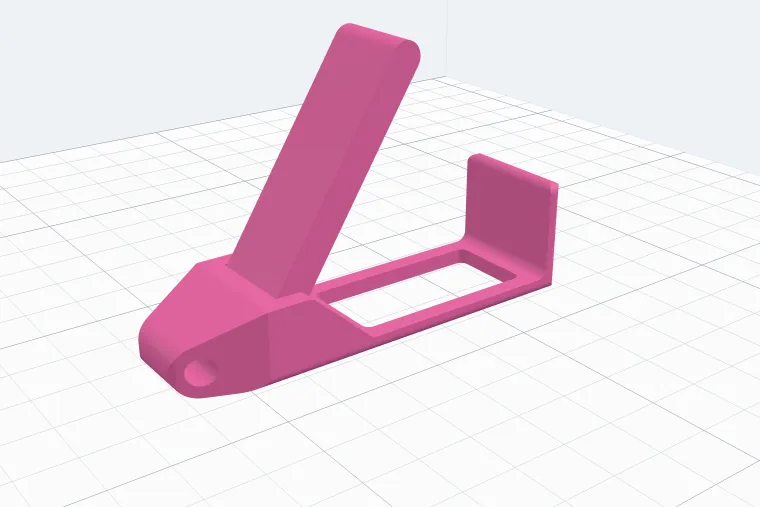 A folding stand with a taller lip at the end