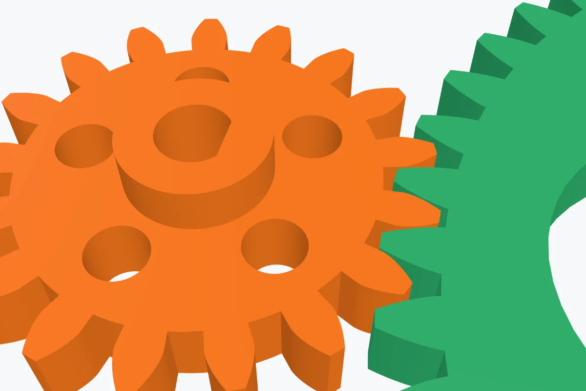 A close-up of 3D printed gears with a D-flat bore, a hub and five lightening holes