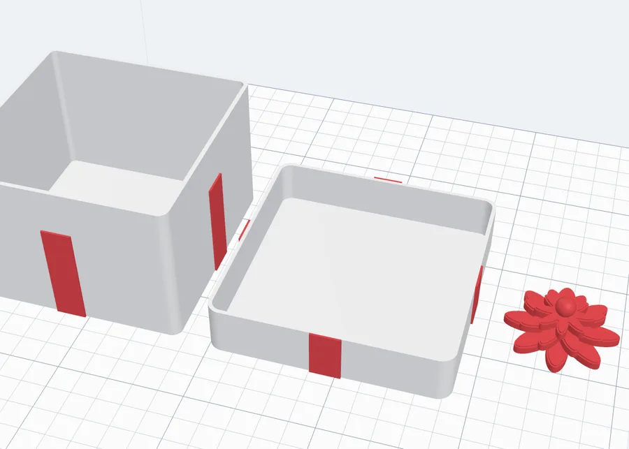 A lid over the box, laid out for printing beside the box