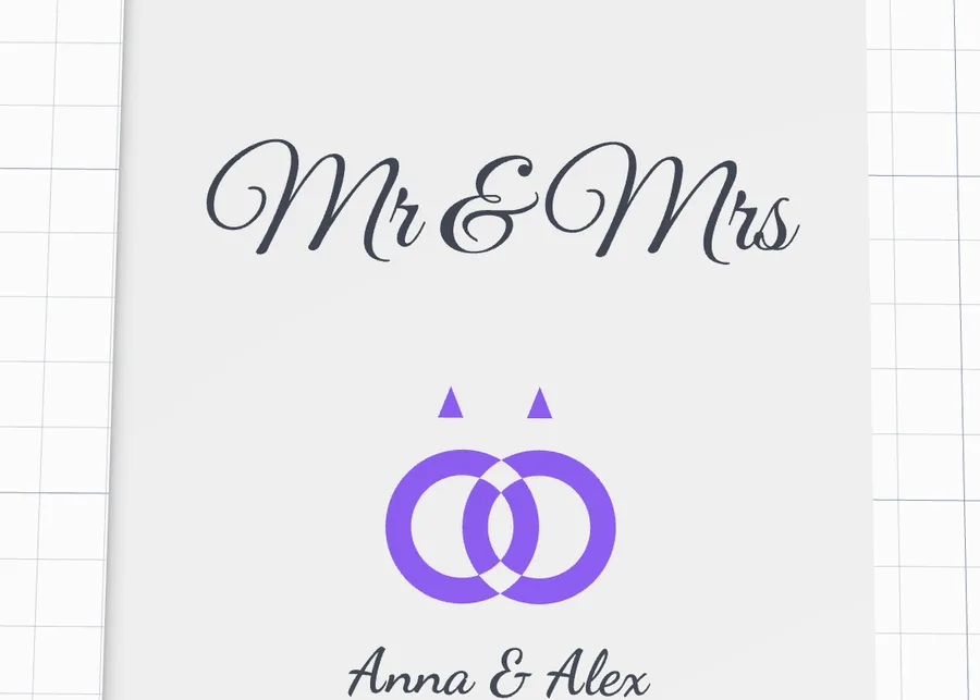 The wedding card closed: Mr and Mrs, the rings, Anna and Alex and the date on the front cover