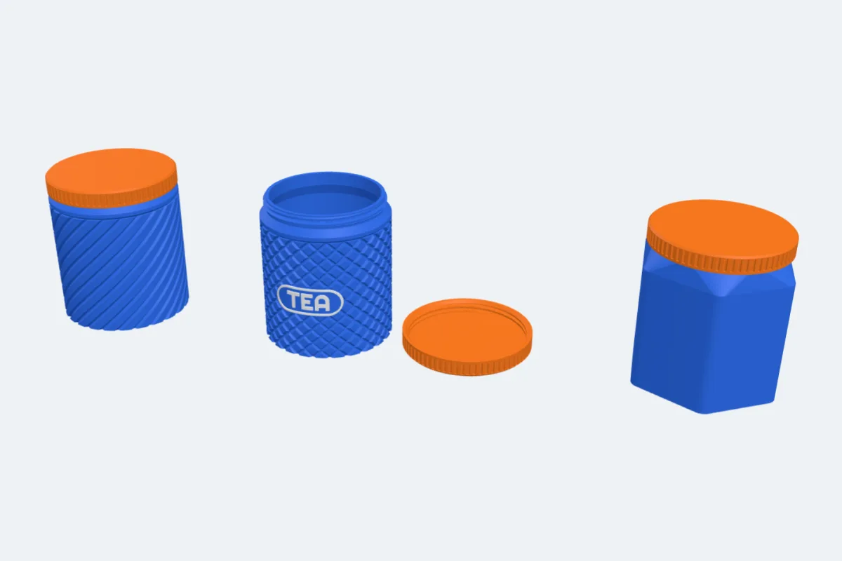 A jar with a spiral pattern, an open jar with a TEA label and its lid, and a hexagon jar