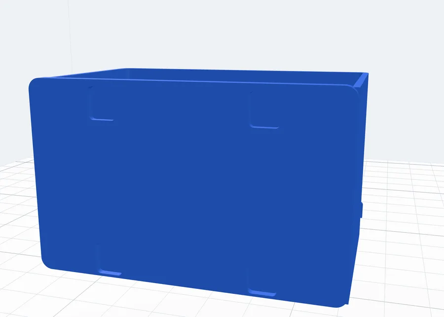 The back of the box with the four pockets for the pegs' heads
