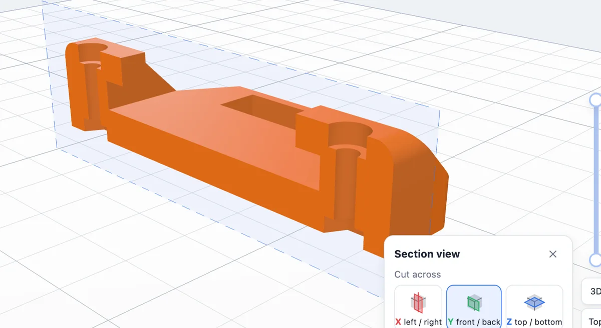 A section through the finished adapter: the head pocket at the top and the bolt hole running down to the nut pocket