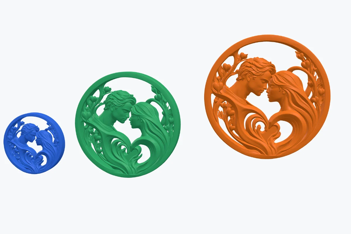 The same 3D printable relief medallion resized to 60, 100 and 140 mm, in blue, green and orange
