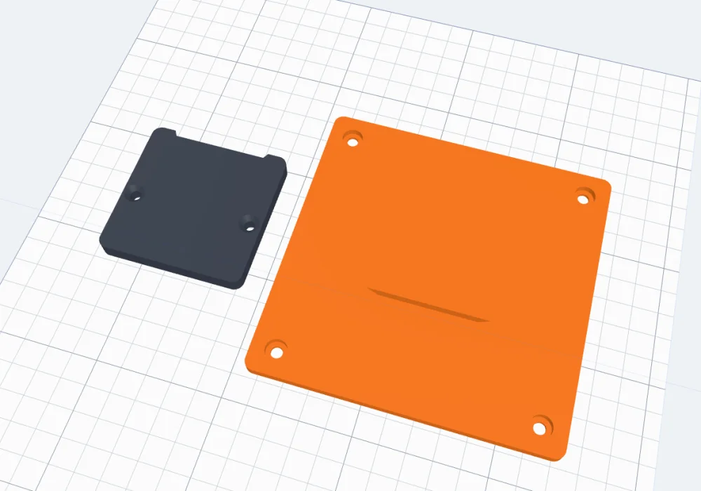 The V wedge apart: the wall part with its V pocket and a 120 mm object part with four VESA 100 holes