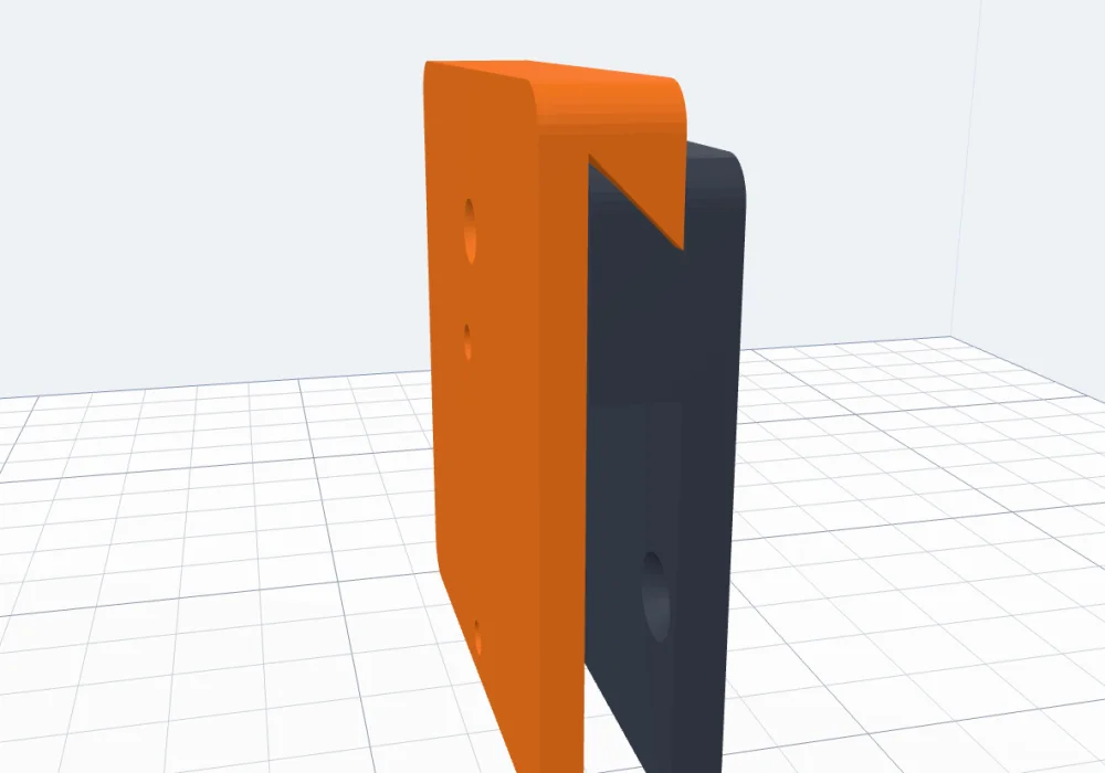 The hook-over cleat from the side: the object part's hook over the wall part's 45 degree ledge