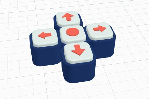 A 3D printed clicker: five pale keys with red arrows and a dot in a plus shape on a navy base
