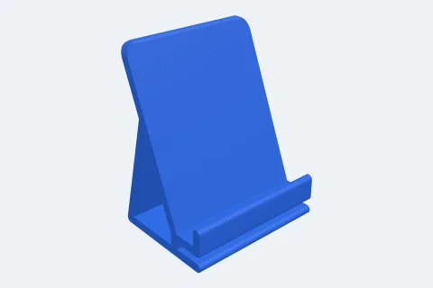 A blue phone stand with a lip and a strut
